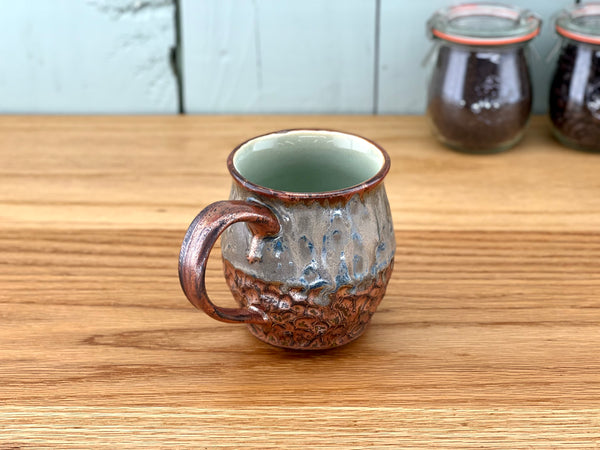 Copper Handle and Rim Carved Mug