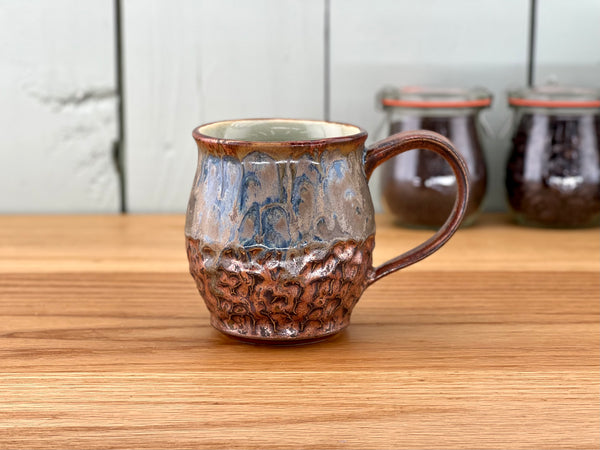 Copper Handle and Rim Carved Mug