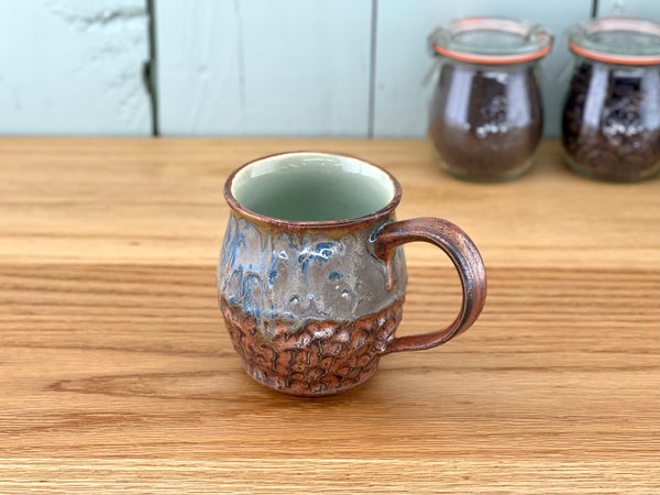 Copper Handle and Rim Carved Mug
